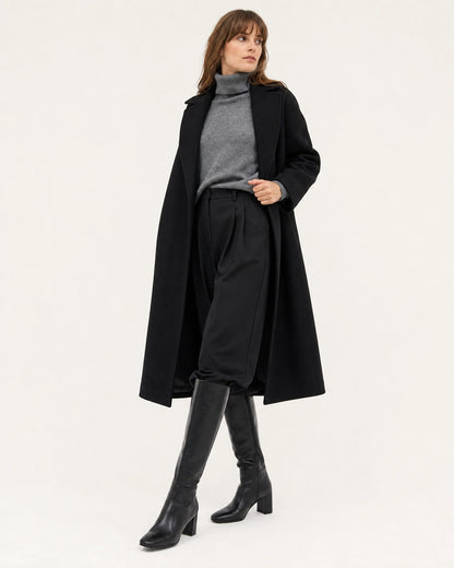Women's black knee-high boots with a broad block heel, hero view.