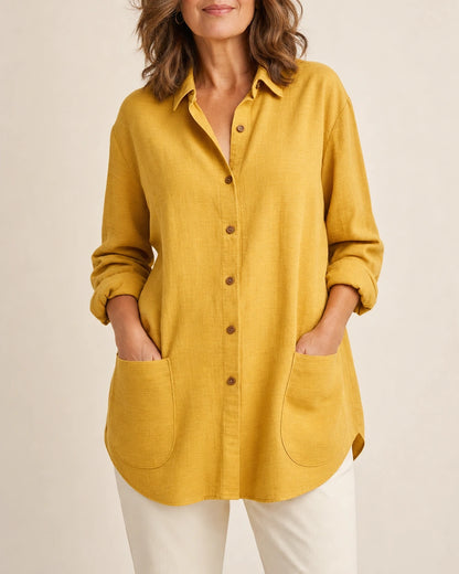 Women's yellow relaxed longline shirt, front product view.