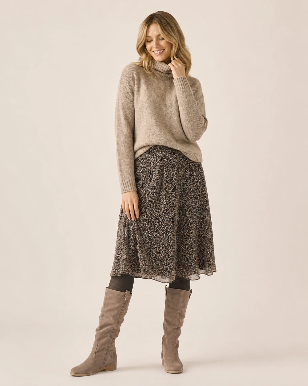 Women's khaki slouch knee-high winter boots with skirt styling.